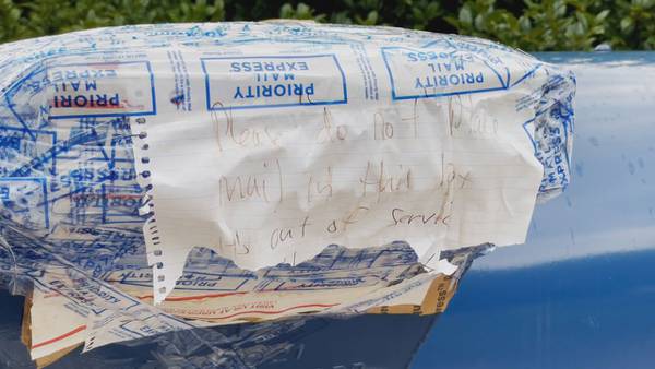 Woman warning others after she says check dropped off at post office mailbox had amount changed