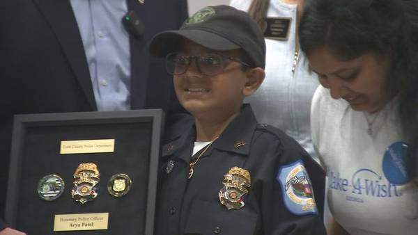 10-year-old cancer survivor lives out dream of becoming Cobb County police officer