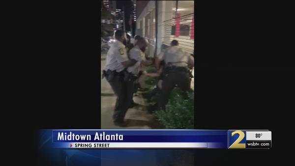 Deputies investigating after video shows officer punching man outside Midtown club