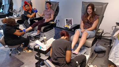 Photos: GA beauty school students pamper local high schoolers headed to New York for national award show