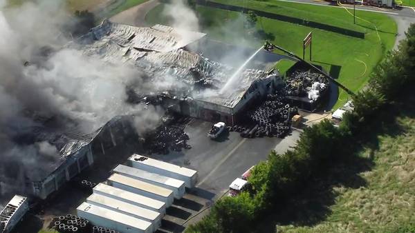 Metro Atlanta tire shop burns for more than 12 hours, witnesses say