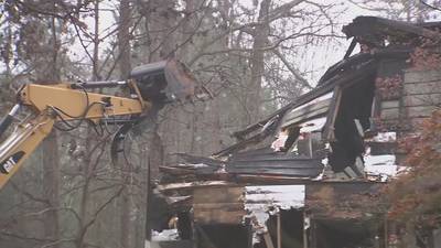 Crews demolish South Fulton home months after it was set on fire, killing 4 people