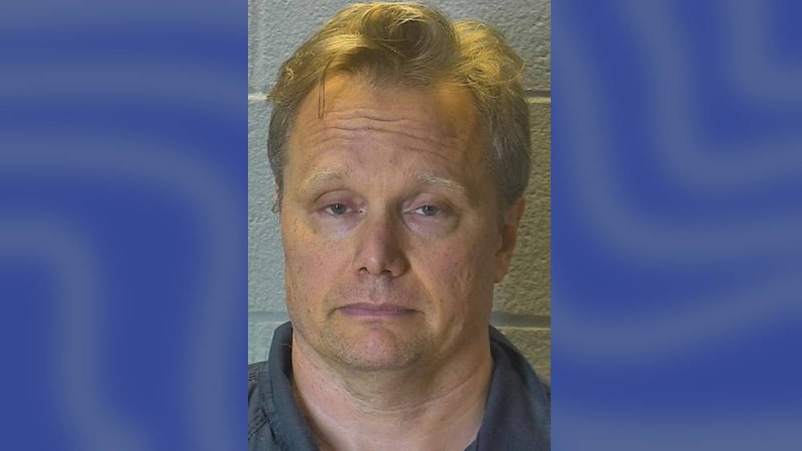 Purdue professor accused of locking son in dog crate, hitting wife with