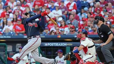 PHOTOS: Braves fall in Game 4 of division series 8-3, Phillies win series 3-1 
