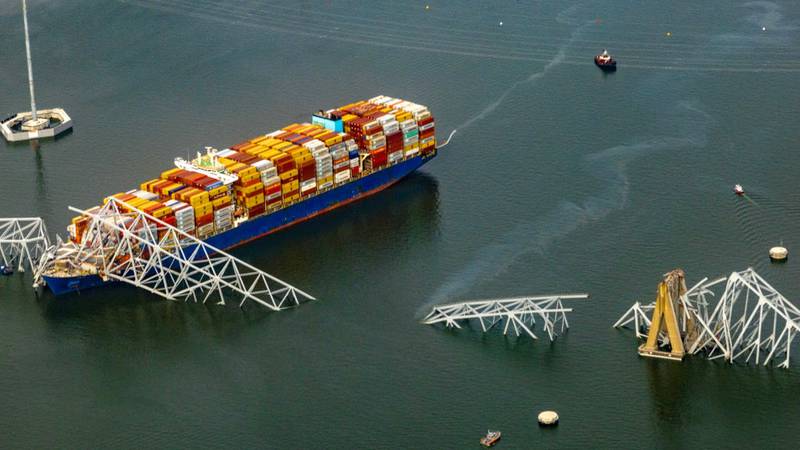 The Dali with containers stacked on it. The bow of the ship is coverage in the Key Bridge wreckage.