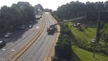 Gwinnett firefighters save worker stuck while working on billboard over highway