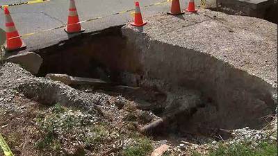 Neighbors concerned about a growing sinkhole in a DeKalb county neighborhood