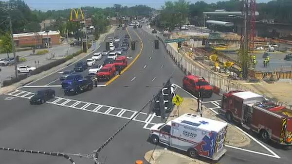 Multiple emergency vehicles responding to site of new Brookhaven city hall project; road shut down