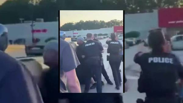 ‘It was a borderline riot;’ Ga. officers called to break up memorial service in Target parking lot