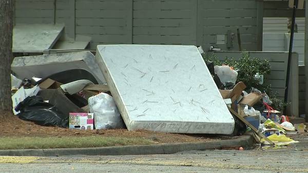 Code enforcement may take action after trash piles up at Gwinnett County apartment complex