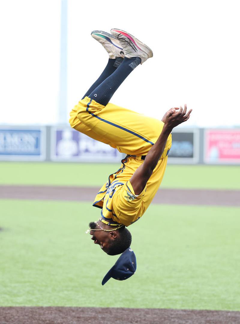 NEW YORK, NEW YORK - AUGUST 12:  Malachi Mitchell of the Savannah Bananas performs a dance routine during their game against the Party Animals at Richmond County Bank Ball Park on August 12, 2023 in New York City.  The Savannah Bananas were part of the Coastal Plain League, a summer collegiate league, for seven seasons. In 2022, the Bananas announced that they were leaving the Coastal Plain League to play Banana Ball year-round. Banana Ball was born out of the idea of making baseball more fast-paced, entertaining, and fun.   (Photo by Al Bello/Getty Images)