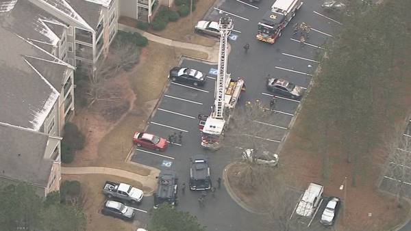 SWAT teams surrounding barricaded gunman at Norcross apartment complex