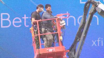 Man was trying to ‘calm my guys down’ who got stuck 70 feet in air trying to repair billboard