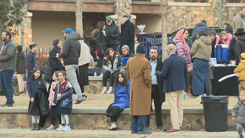 Hundreds gather for menorah lightings across metro Atlanta after mass shooting
