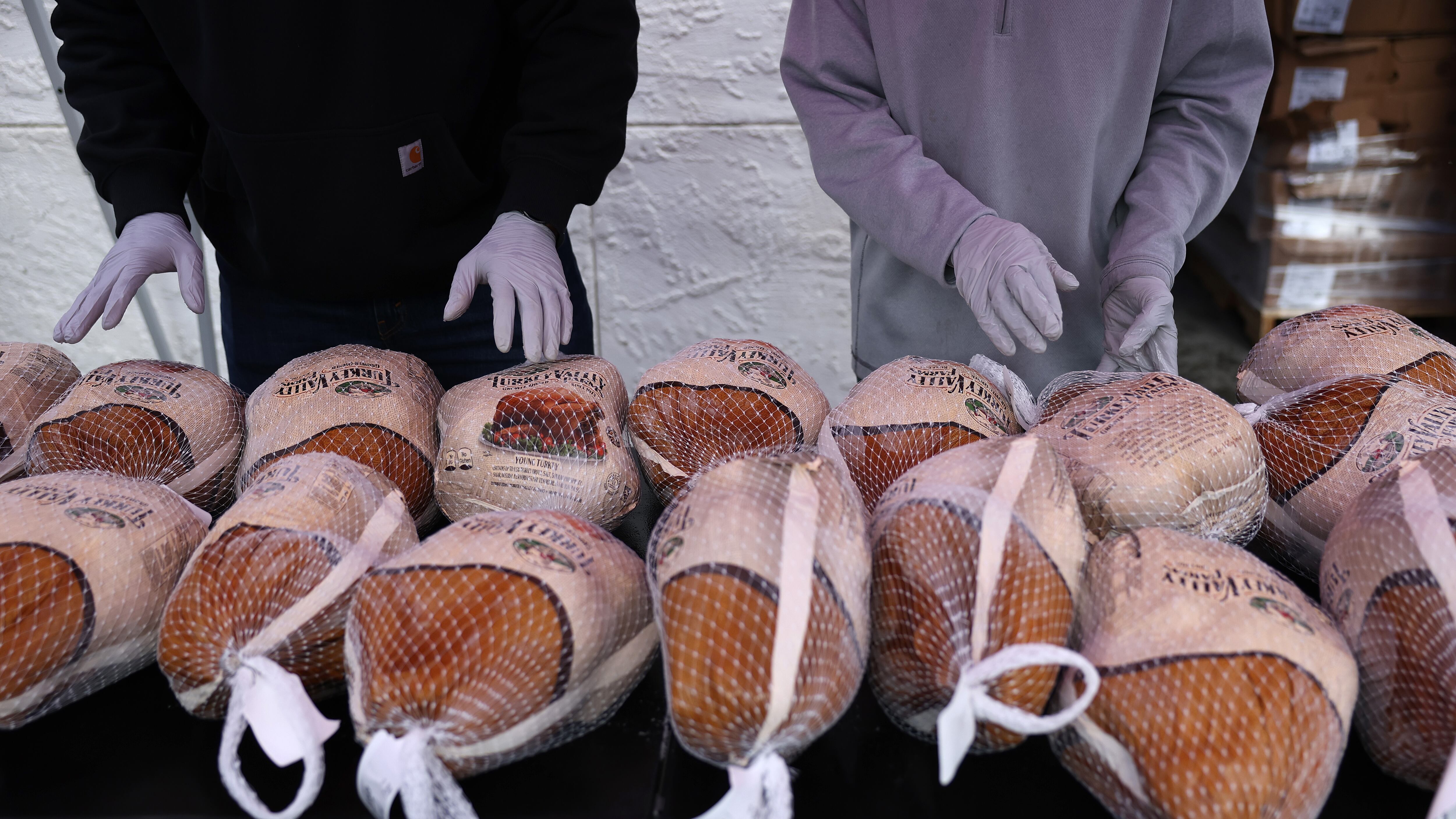 Several packages of poultry are seen.