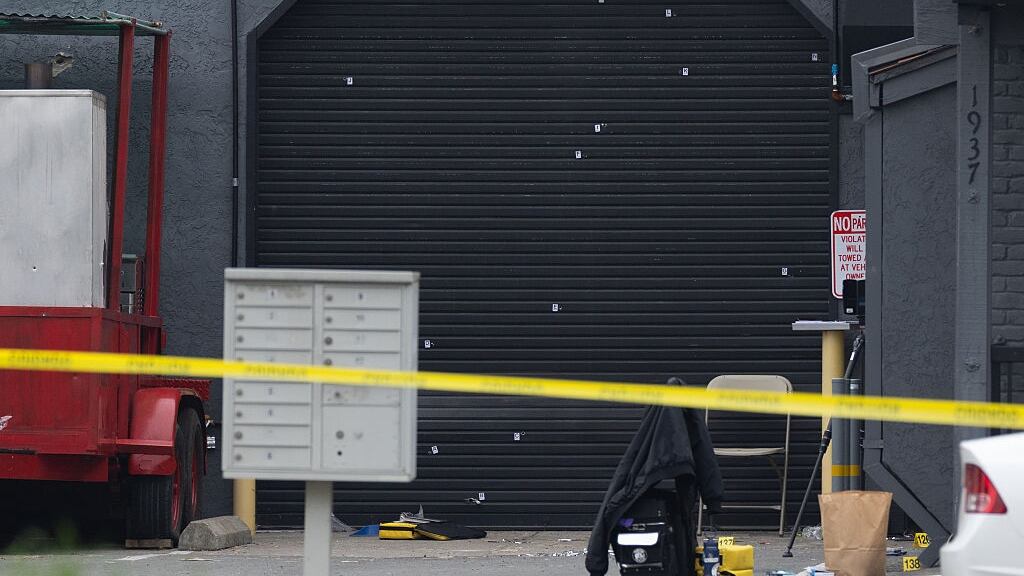 A garage with crime scene tape.