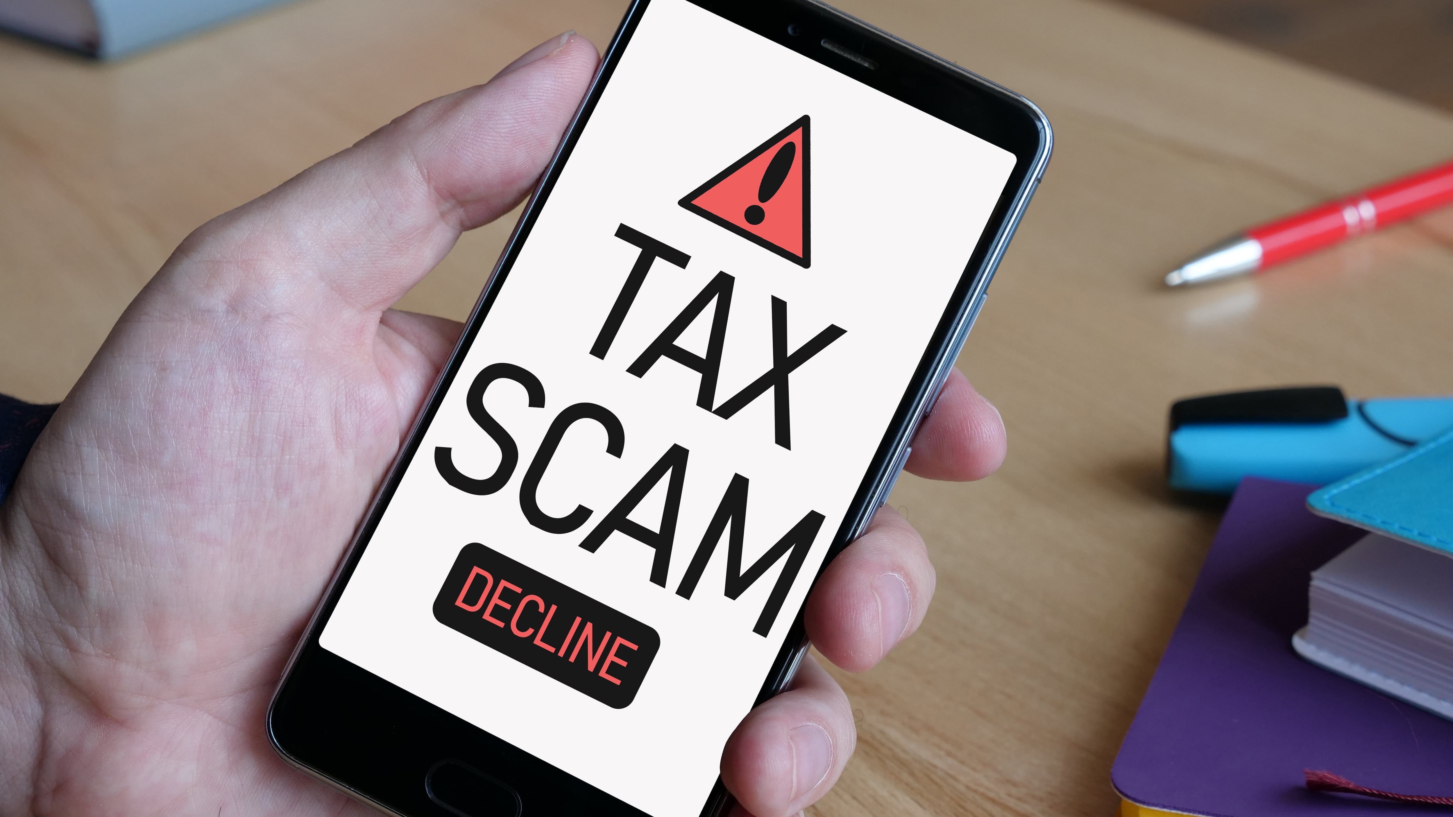 Tax Scam is shown using a text. Internal Revenue Service IRS