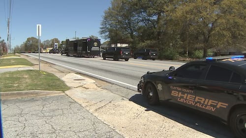 Scene of officer-involved deadly shooting in Clayton County on Thursday, March 28, 2024. Police investigate after they say a sexual assault suspect opened fire on them.