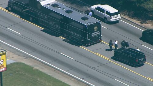 Scene of officer-involved deadly shooting in Clayton County on Thursday, March 28, 2024. Police investigate after they say a sexual assault suspect opened fire on them.