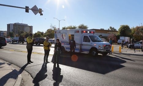 LAS VEGAS, NEVADA - DECEMBER 06: An ambulance leaves on Maryland Parkway on the east side of the UNLV campus after a shooting on December 06, 2023 in Las Vegas, Nevada. According to Las Vegas Metro Police, a suspect is dead and multiple victims are reported after a shooting on the campus. (Photo by Ethan Miller/Getty Images)