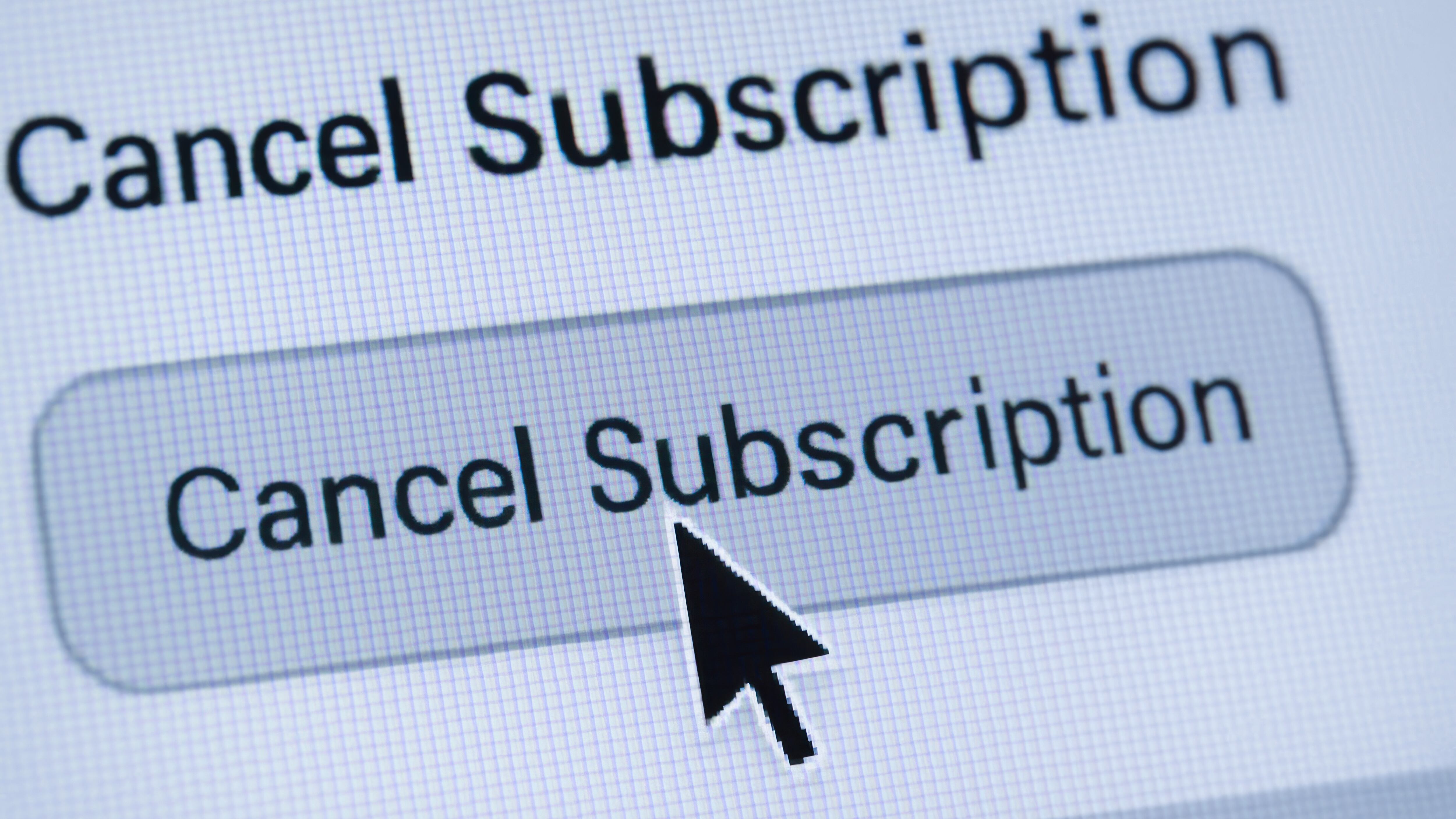 A termination concept with cursor clicking on cancel subscription button on digital screen representing end of service agreement