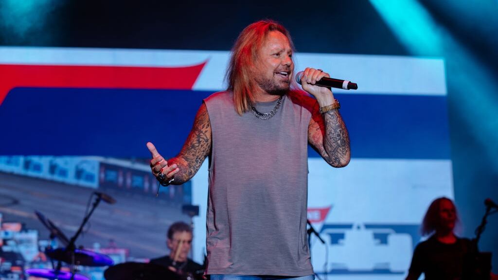 Vince Neil singing on stage