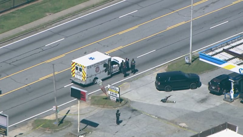 Scene of officer-involved deadly shooting in Clayton County on Thursday, March 28, 2024. Police investigate after they say a sexual assault suspect opened fire on them.