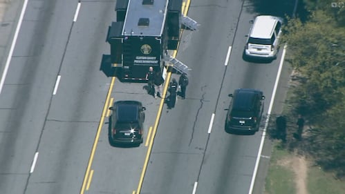 Scene of officer-involved deadly shooting in Clayton County on Thursday, March 28, 2024. Police investigate after they say a sexual assault suspect opened fire on them.