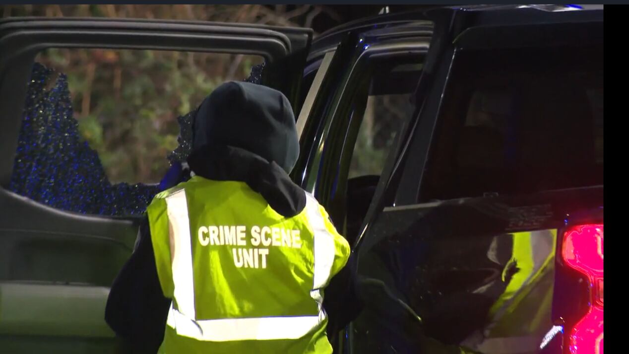 A truck with a damaged window is seen.