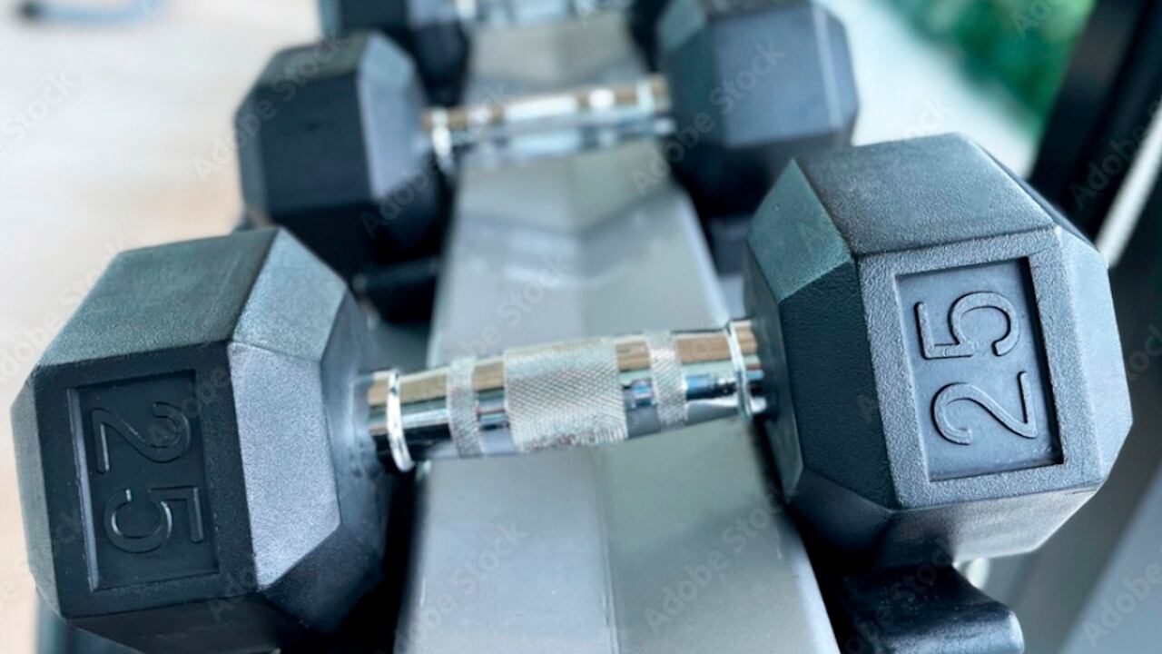 Gym jealousy : Woman accused of hurling 25 - pound weight at perceived love rival