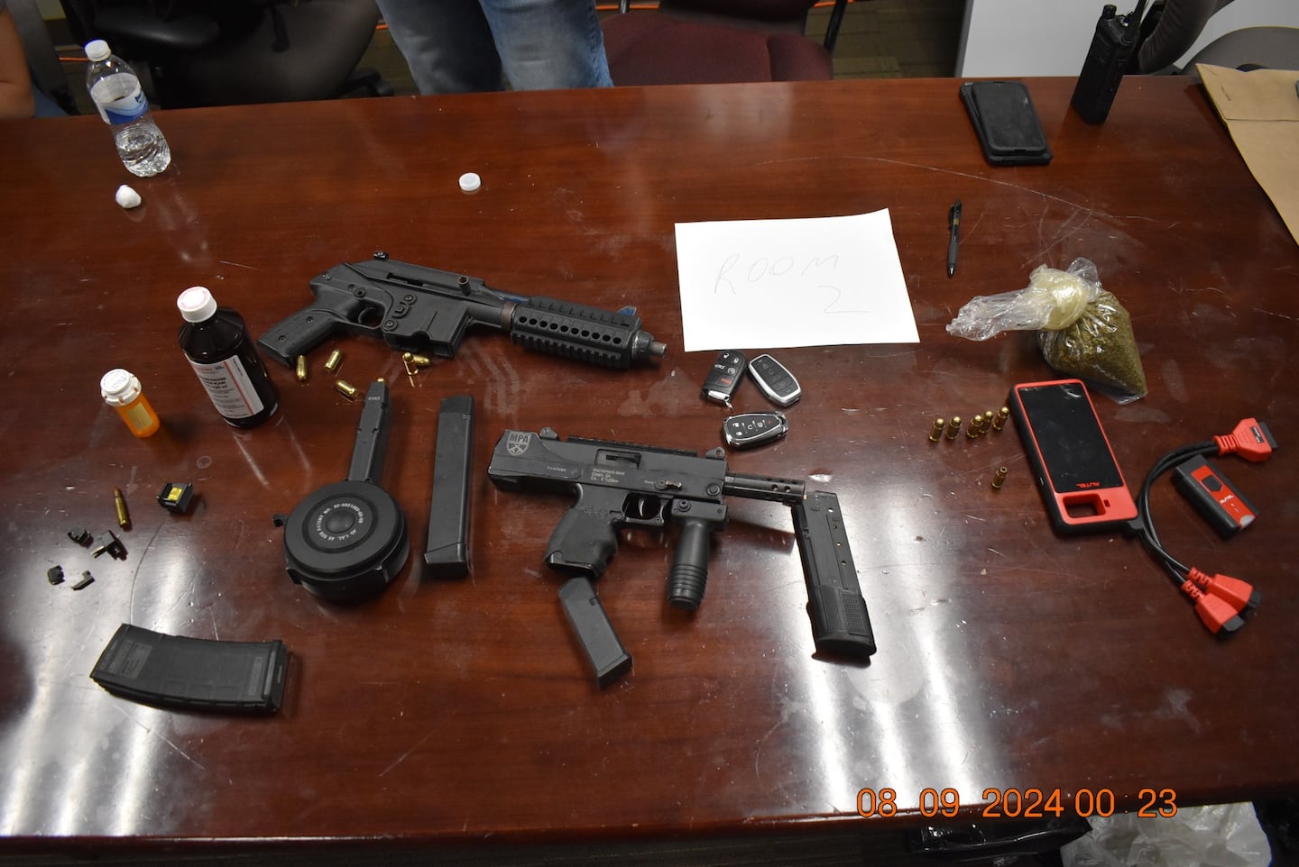 Police said the men were trafficking guns and drugs.