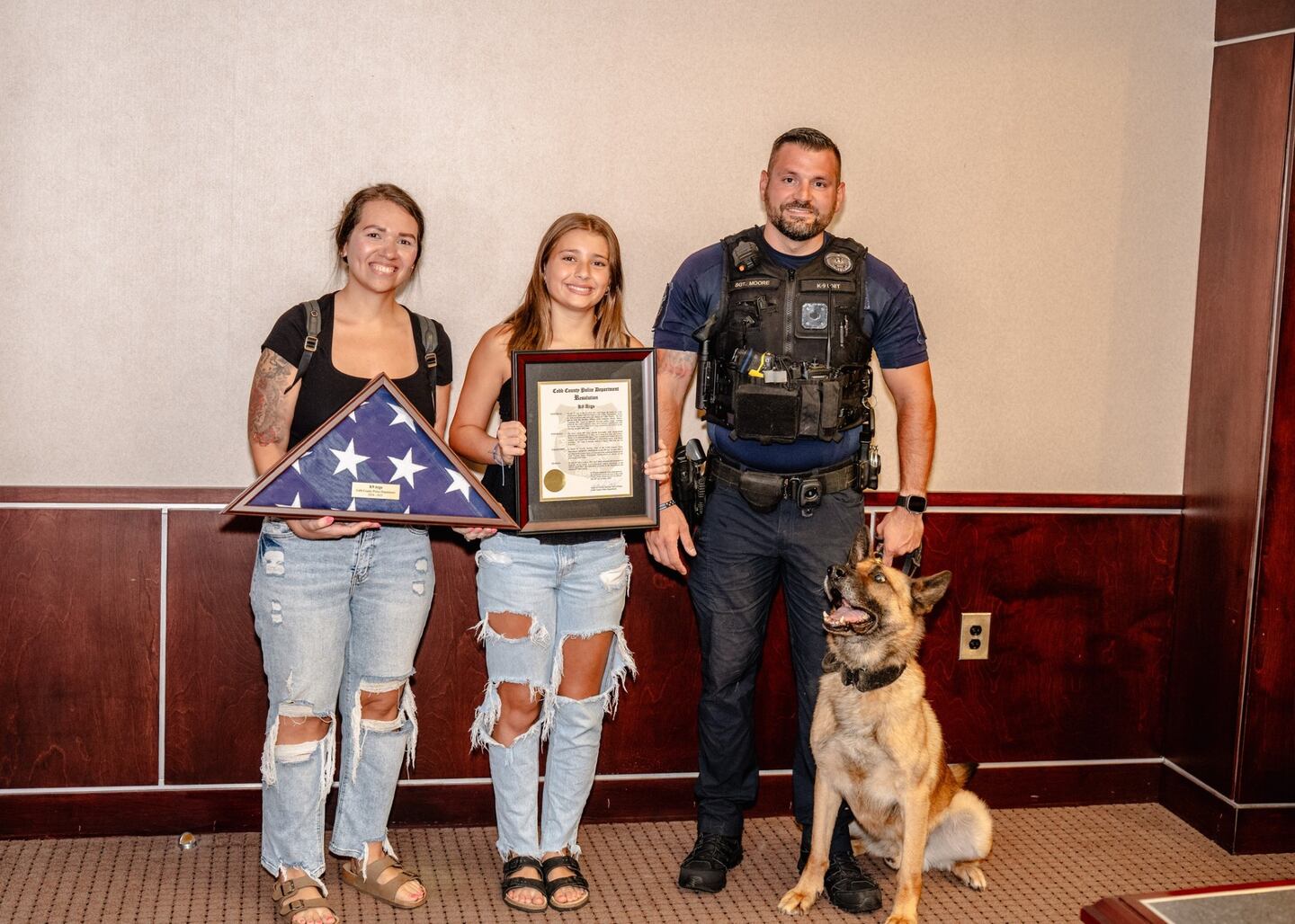 Retiring K9 Argo is shown with his crew during a presentation ceremony given by Cobb County Police Dept.