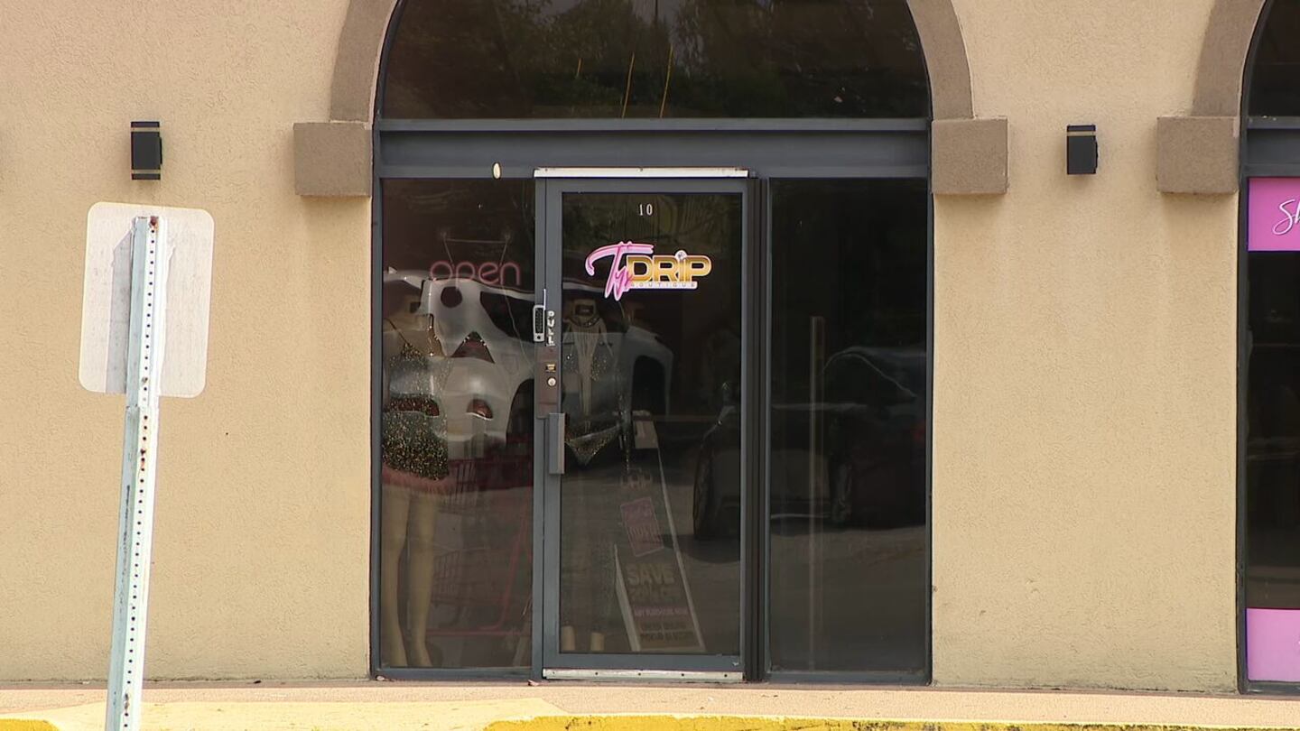 A woman said an employee of a Gwinnett County boutique followed her into a dressing room.