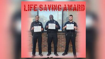 Conyers police receive award after working together to save woman in fire 