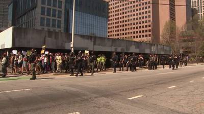 Protestors line the streets of downtown Atlanta to call for mayor to stop APD training facility