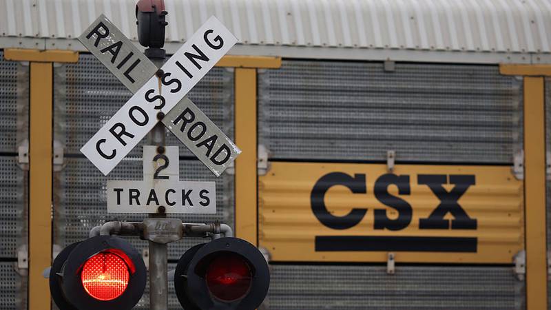 Police said the CSX train contained cases of vodka and Red Bull energy drink.