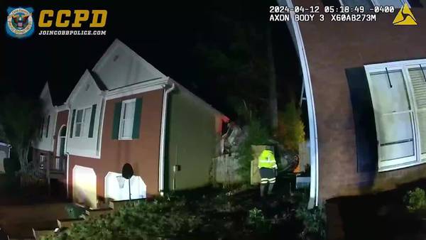 ‘The car was on top of me:’ Bodycam footage shows suspected DUI driver crash into Cobb home