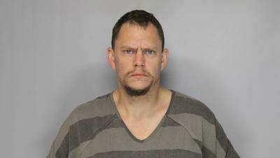 Man facing felonies for possessing handgun, meth while driving stolen car in Hall Co., deputies say